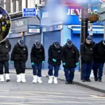 Four police officers injured in south London clash