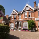 Wimbledon School of English director to run London Marathon for refugee charity