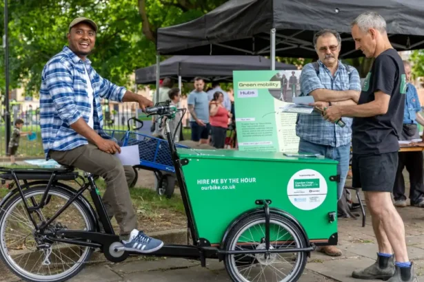 Alper showing off a cargo bike.
