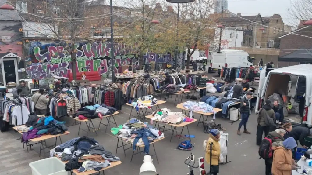 How do local markets and shops support Lewisham’s community and culture?